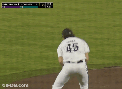 Baseball Player Swinging Bat At Ball In Front Of SBC Banner GIF