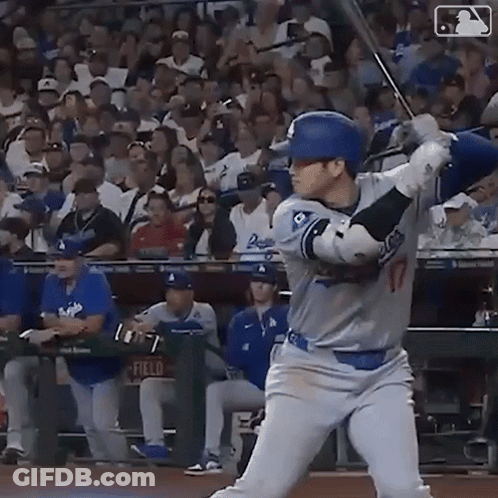 Baseball Player Swinging Bat At Ball GIF