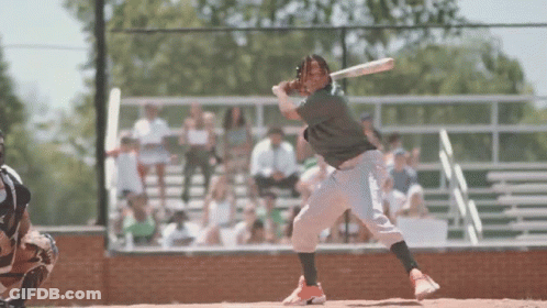 Baseball Player Swinging Bat At Ball GIF
