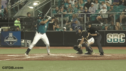 Baseball Player Swinging Bat At Ball With SBC Banner GIF