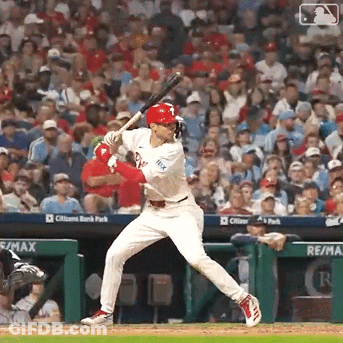 Baseball Player Swinging Bat At Game GIF