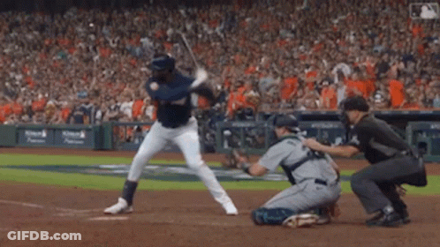 Baseball Player Swinging Bat At Pitch GIF