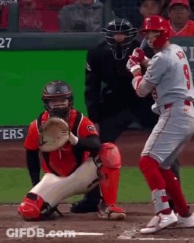 Baseball Player Swinging Bat At Pitch GIF