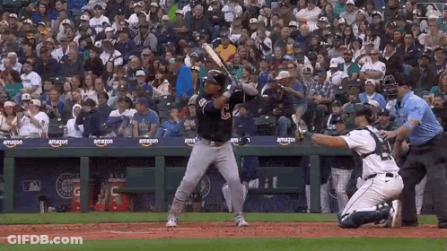 Baseball Player Swinging Bat Catcher Watches GIF