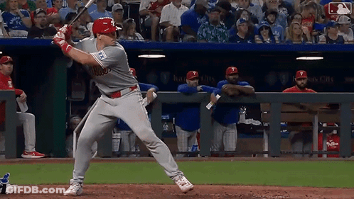 Baseball Player Swinging Bat In Front Of Crowd GIF