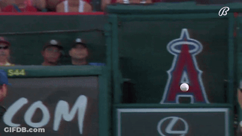 Baseball Player Swinging Bat In Front Of Lexus Sign GIF
