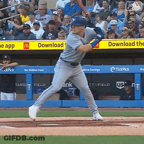 Baseball Player Swinging Bat In Front Of McDonald's Ad GIF