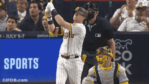 Baseball Player Swinging Bat In Front Of Petco Park Ad GIF