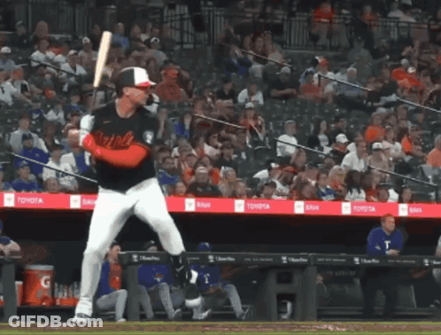 Baseball Player Swinging Bat In Front Of True Banner GIF