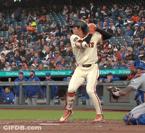 Baseball Player Swinging Bat In Giants Uniform GIF