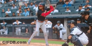 Baseball Player Swinging Bat GIF
