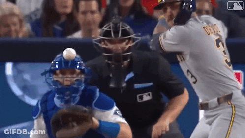Baseball Player Swinging Bat While Catcher Watches GIF
