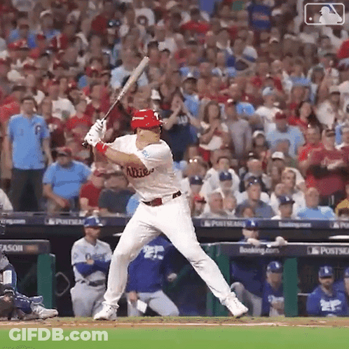 Baseball Player Swinging Bat With Crowd Watching GIF