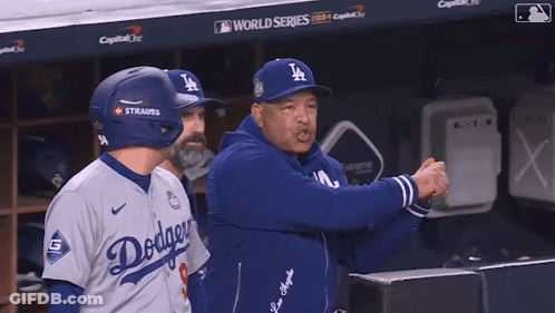 Baseball Player Talking To Coach In Dodgers Jersey GIF