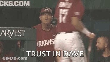 Baseball Player Talking To Coach In Dugout GIF