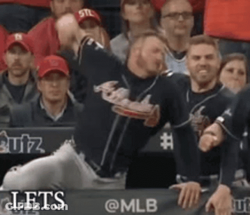 Baseball Player Throwing Ball In Front Of Crowd GIF