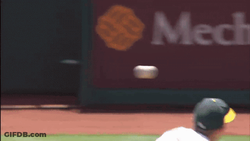 Baseball Player Throws Ball In Front Of Madame Advertisement GIF