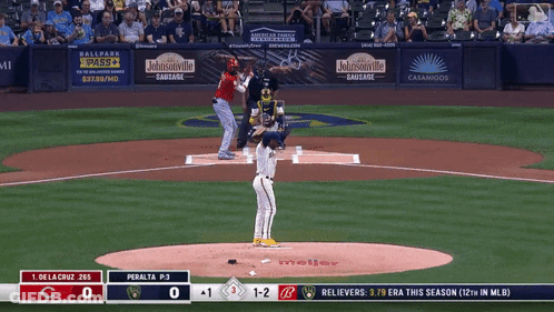 Baseball Player Throws Ball In Front Of Madame Advertisement GIF