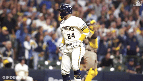 Baseball Player Walking Towards Home Plate With J.com Banner GIF