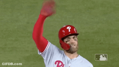 Baseball Player Waving Hand In Red Helmet GIF