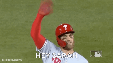 Baseball Player Waving Helmet And Gloves GIF