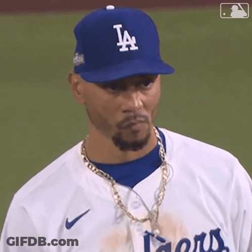 Baseball Player Wearing LA Hat And Chain GIF