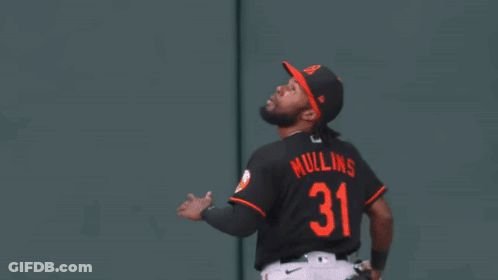 Baseball Player Wearing Number 31 Catches Ball GIF