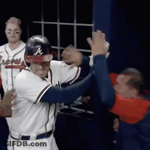 Baseball Player With A On Helmet High Five GIF
