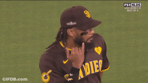 Baseball Player With Hat And Otis Jr. Shirt GIF