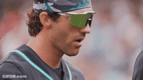Baseball Player With Headband And Sunglasses Looking Left GIF