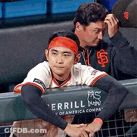 Baseball Player With Orange Headband Sitting GIF