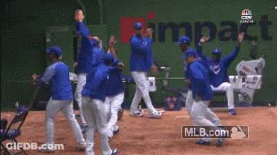 Baseball Players Celebrating Impact GIF
