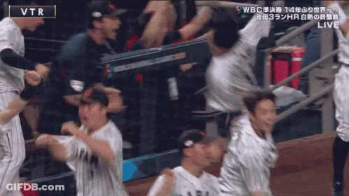 Baseball Players Celebrating Under VTR Logo GIF