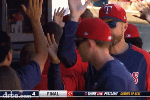 Baseball Players High Five Scoreboard Coming Up Next GIF