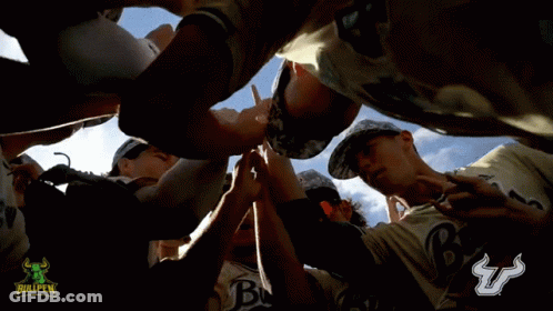 Baseball Players Huddle With Bullpen Logo GIF