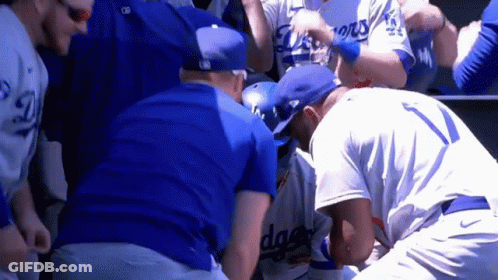 Baseball Players Huddled GIF