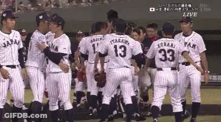 Baseball Players Huddled Together Number 33 GIF