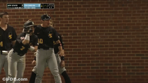 Baseball Players Huddled With Number 40 GIF