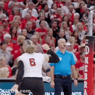 Baseball Players Hugging On Field GIF