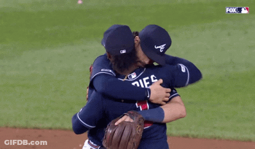 Baseball Players Hugging With Fox Logo GIF
