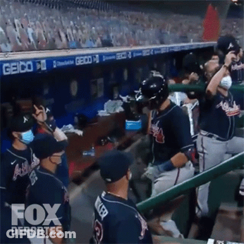 Baseball Players In Dugout With Fox Deportes GIF