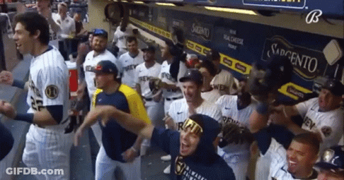 Baseball Players In Dugout With Sabretto Sign GIF