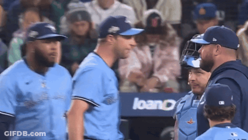 Baseball Players In Front Of Loan Sign GIF