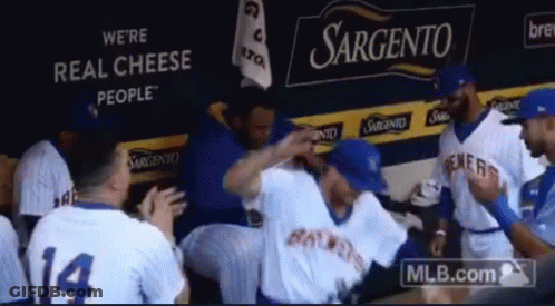 Baseball Players In Front Of Sargento Sign GIF