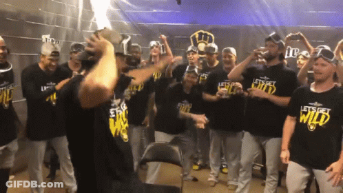 Baseball Players In Let's Get Wild Shirts GIF