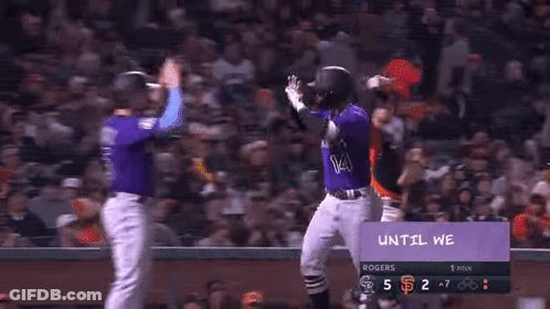 Baseball Players In Purple Colorado Uniforms GIF