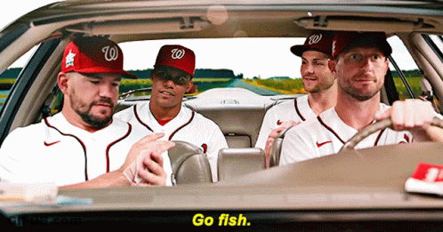 Baseball Players In W Hats Driving Car GIF