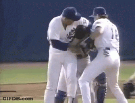 Baseball Players On Field With Number 1 Jersey GIF