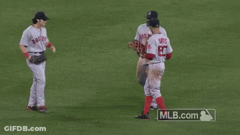 Baseball Players On Field With Number 50 Jersey GIF