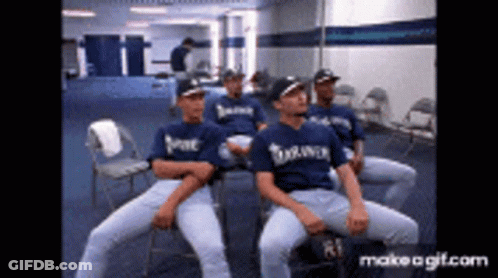 Baseball Players Sitting In Locker Room GIF